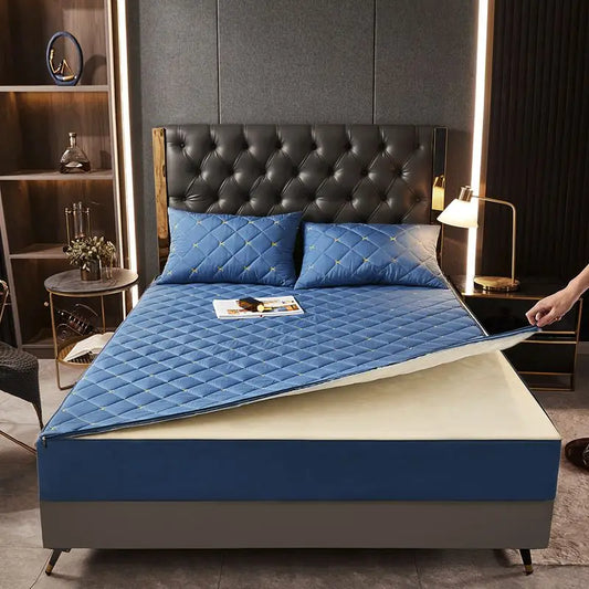 Housse de matelas anti-acarien bleue capitonnée