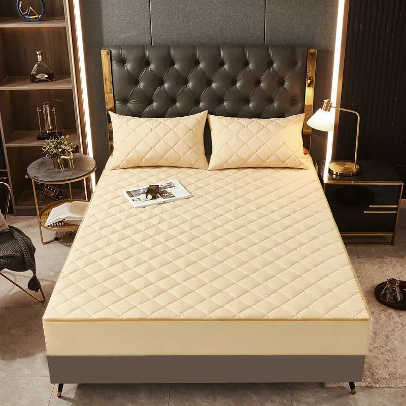 Housse de matelas anti-acarien beige capitonnée