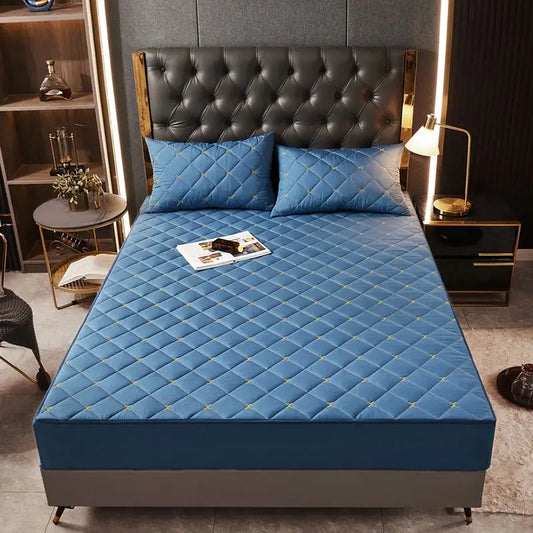 Housse de matelas anti-acarien bleue capitonnée