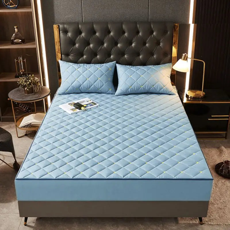 Housse de matelas anti-acarien bleu ciel capitonnée