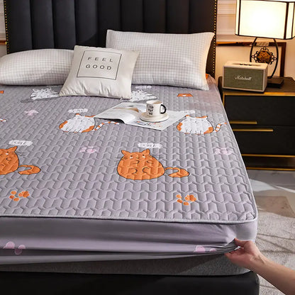 Housse de matelas imperméable chat gauche