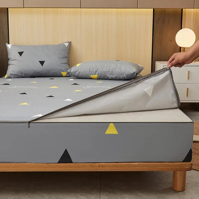 Protège-matelas imperméable triangles gris devant